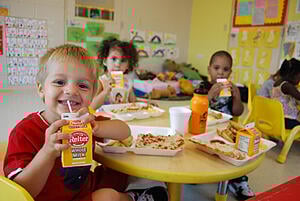 Preschool-aged children enjoying lunchtime. High-quality preschool programs, like the ones offered at Horizon, provide a quality preschool education, a structured environment and nutritious meals and snacks.