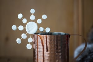 Hot chocolate decorated with a marshmallow snowflake