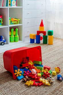 Children's playroom with plastic colorful educational blocks toys. Games floor for preschoolers kindergarten.