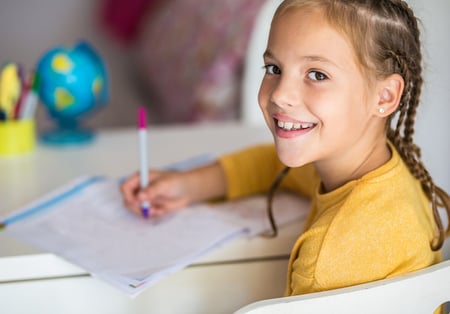 child at homework space