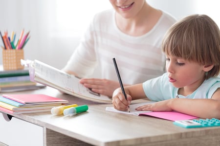 child focused on homework