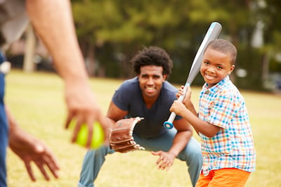 child playing baseball