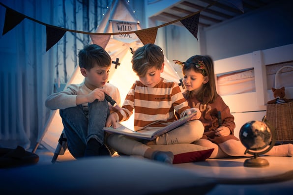 kids camping indoors during the summer heat