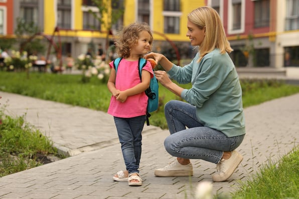 child being dropped off at preschool