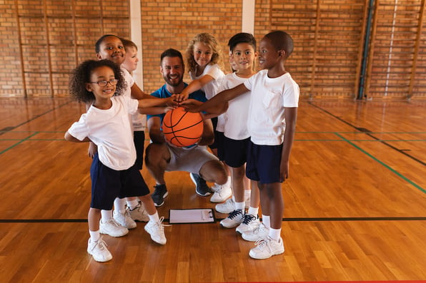 group of kids playing team sport